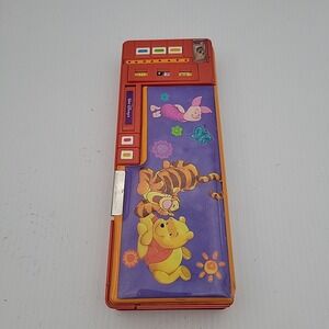 Walt Disney Winnie the Pooh Pencil Case Push Button Popup Sharpener Calendar vtg